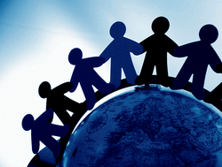 line of students holding hands covering the globe 