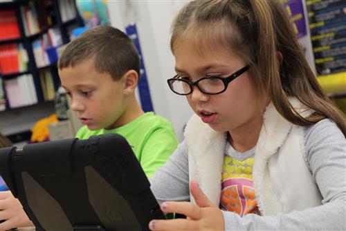 students on laptop